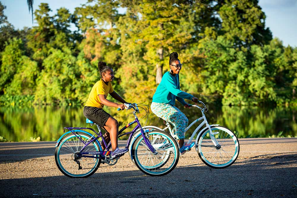 Two women riding bikes in Baton Rouge