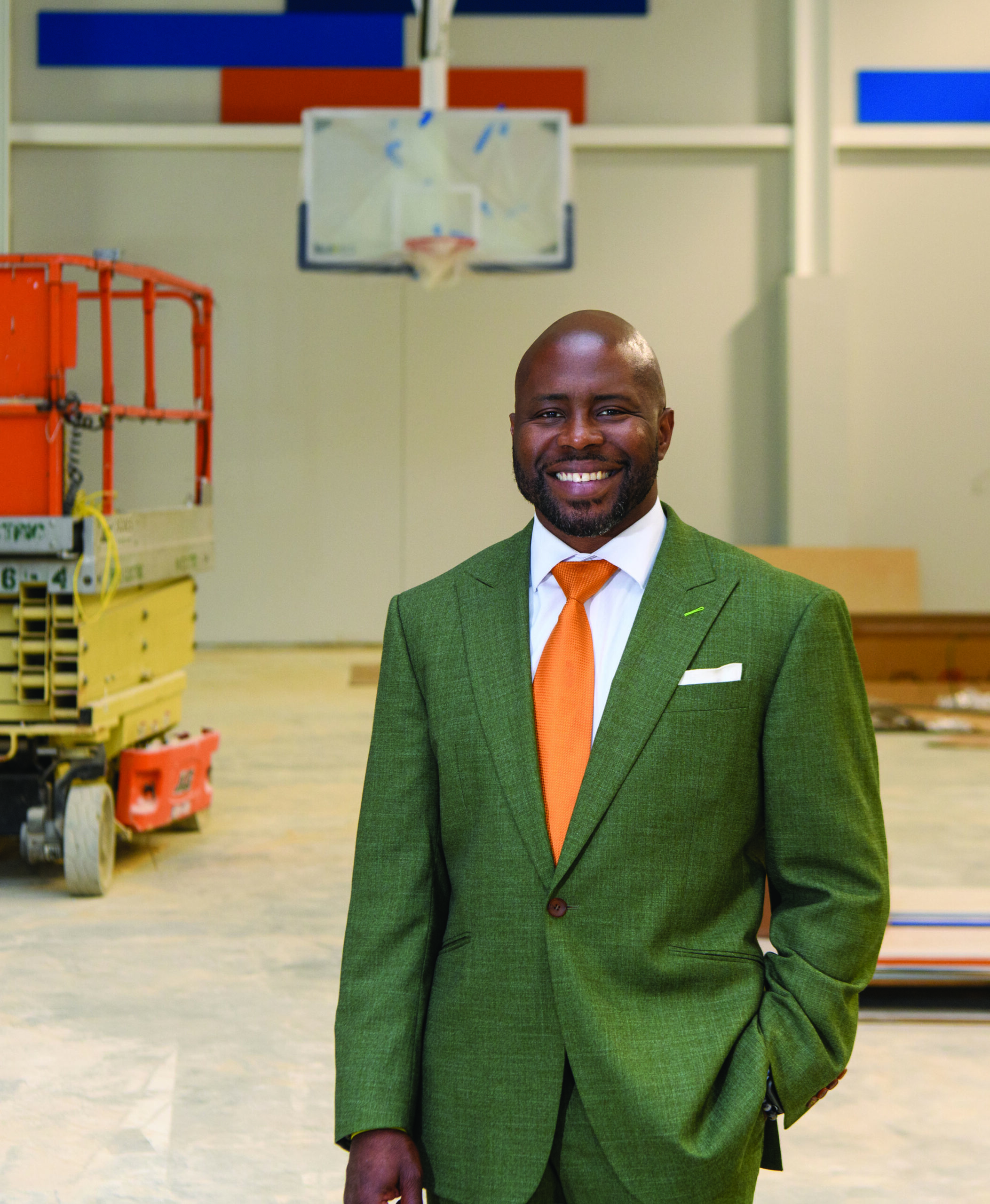 Clay Young visits the Inspiration Center as construction wraps up on the basketball court.